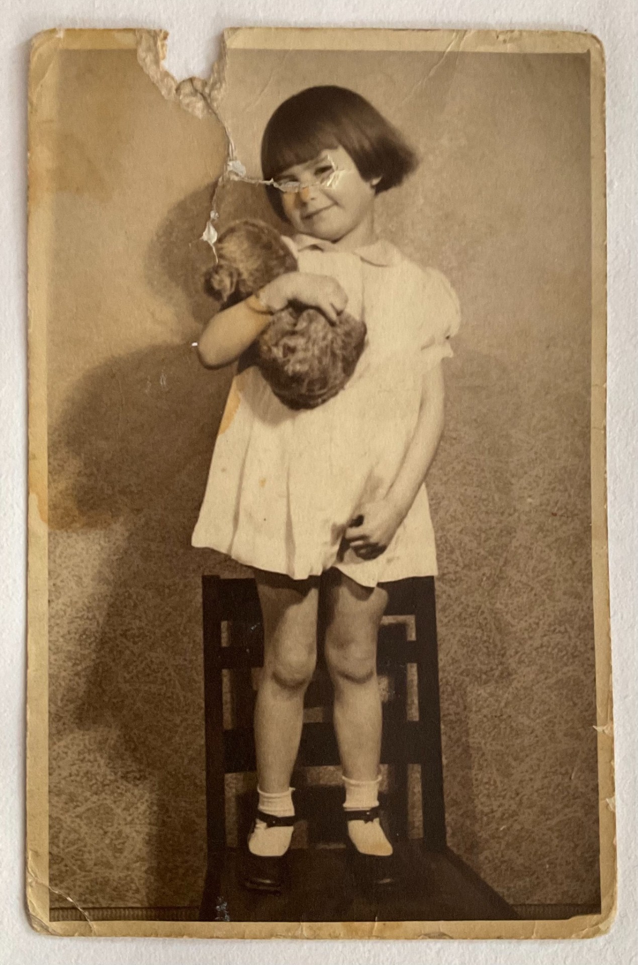 Little girl with her teddy — before restoration