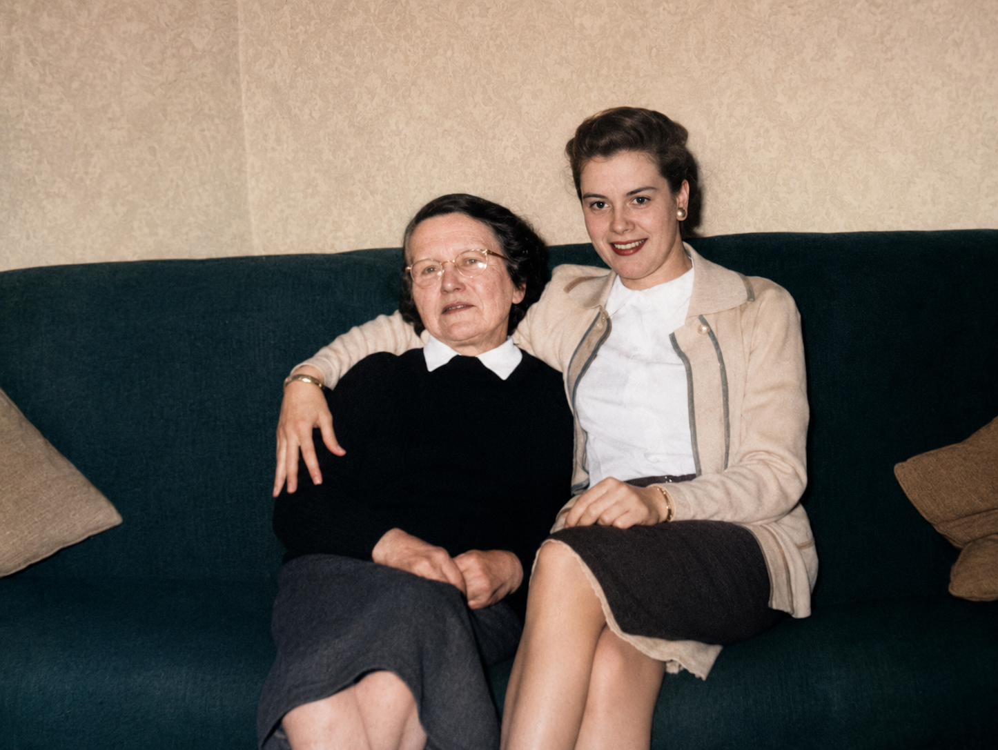 Mother and daughter on the sofa — after restoration